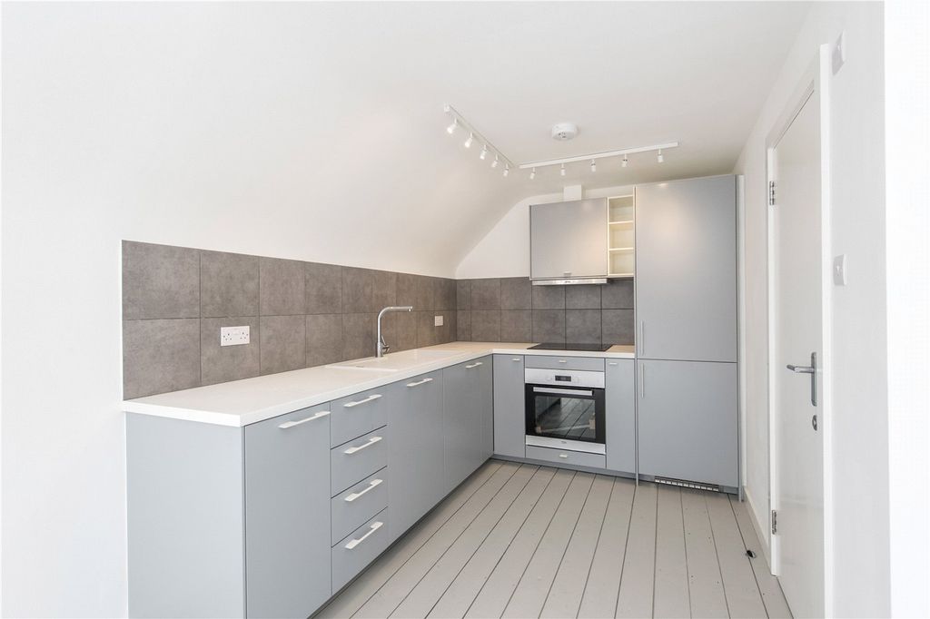 Property photo 3 of 12 Kitchen