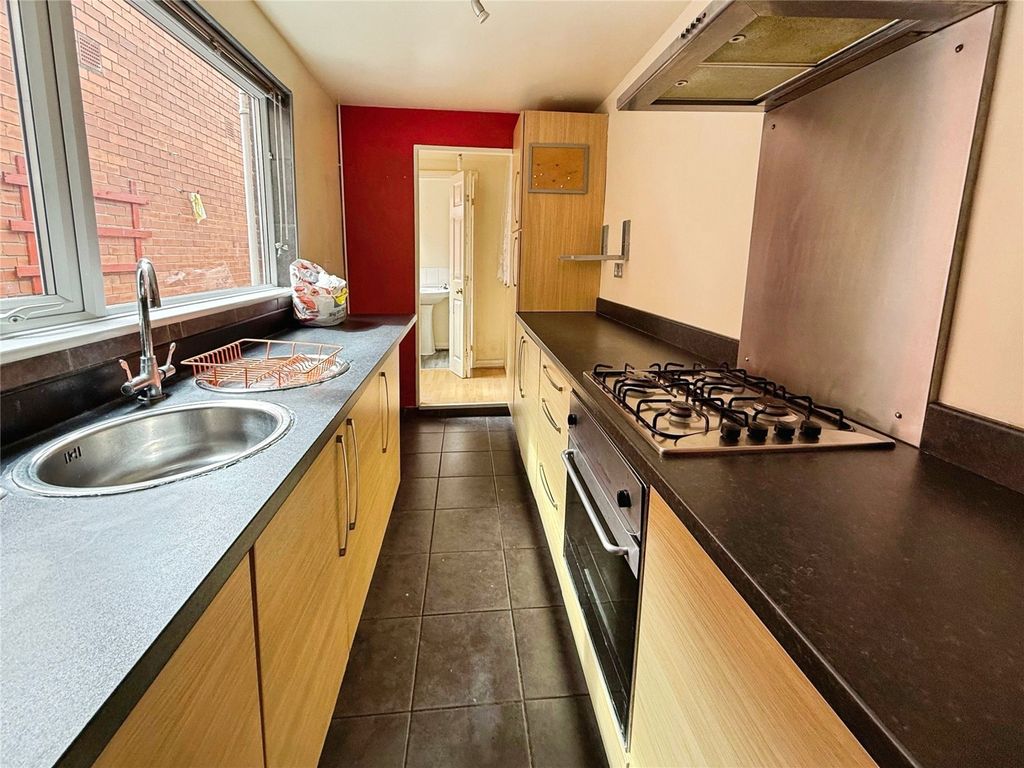 Property photo 3 of 12 Kitchen