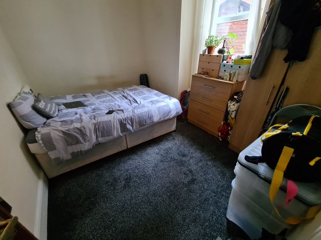 Property photo 2 of 6 A Cozy Bedroom With A Single Bed, A Window Bringin...
