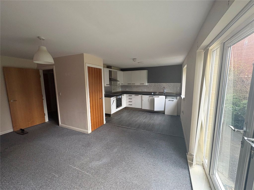 Property photo 2 of 11 Kitchen Living Area