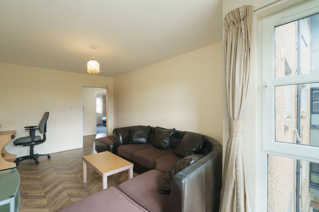Property photo 3 of 12 2. Living Room Angle 2