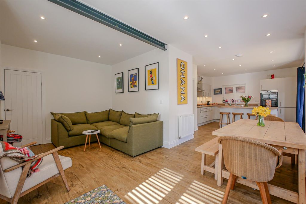 Property photo 2 of 17 Kitchen/Dining/Family Room