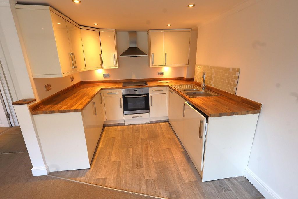 Property photo 3 of 7 Kitchen Area