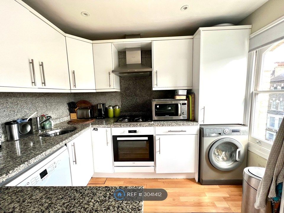 Property photo 3 of 10 Open-Plan Kitchen