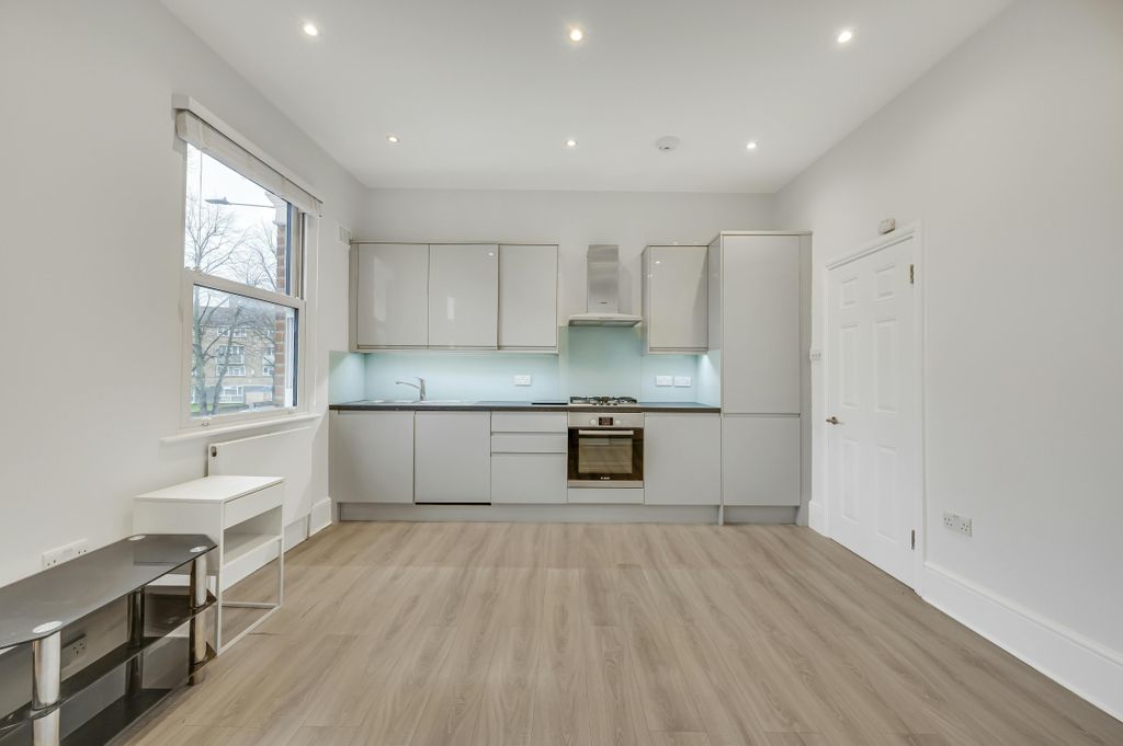 Property photo 1 of 8 Kitchen - Living Space