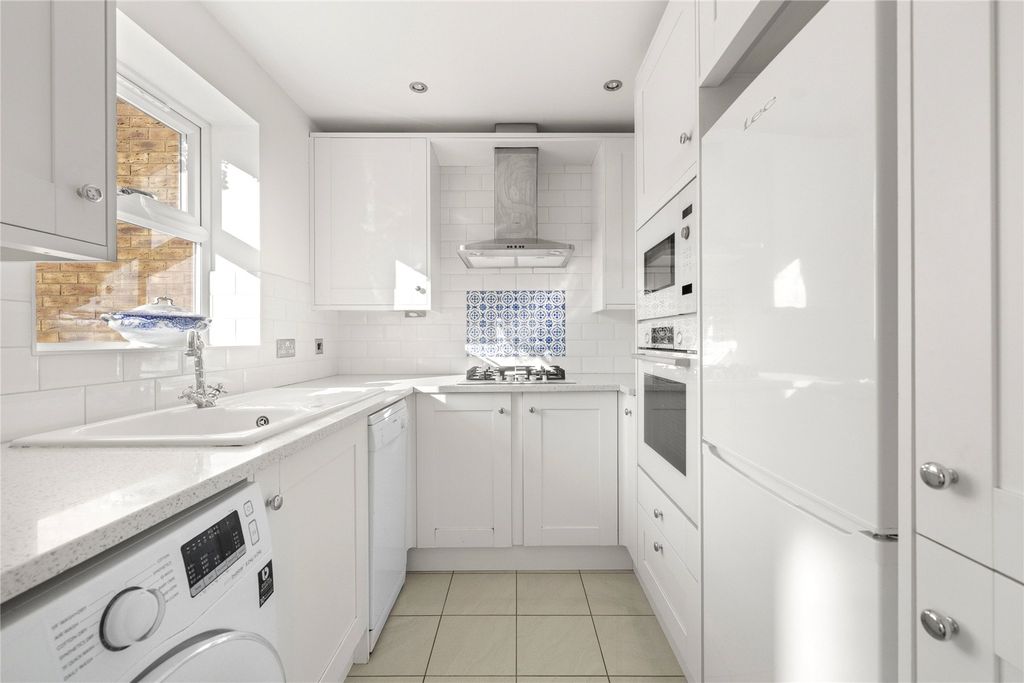 Property photo 3 of 14 Stylish Kitchen