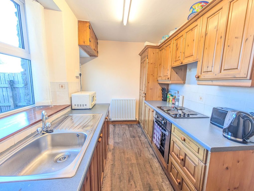 Property photo 2 of 12 Kitchen
