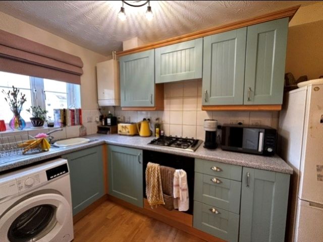 Property photo 3 of 12 Kitchen