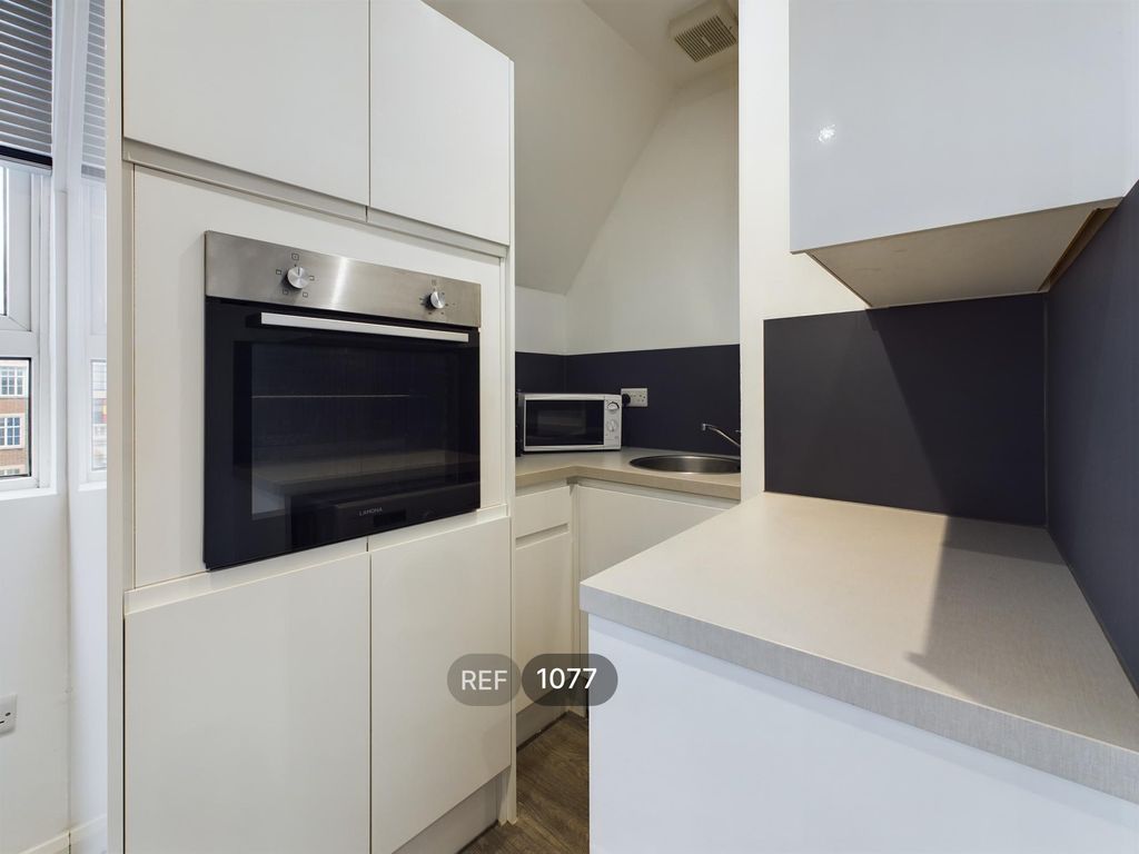 Property photo 2 of 10 Kitchen & Living Area