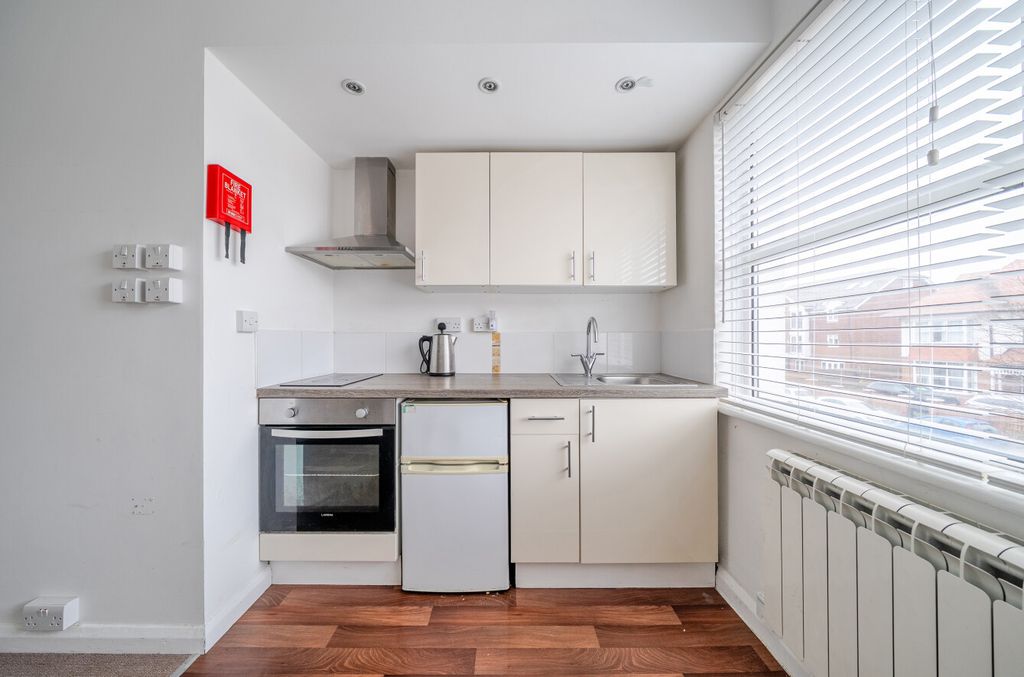 Property photo 2 of 6 Kitchen Area