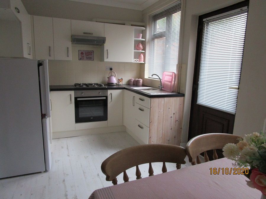 Property photo 3 of 8 Kitchen 