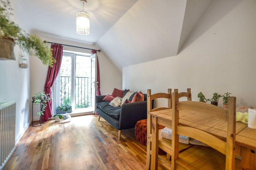 Property photo 3 of 7 Living/Dining Area