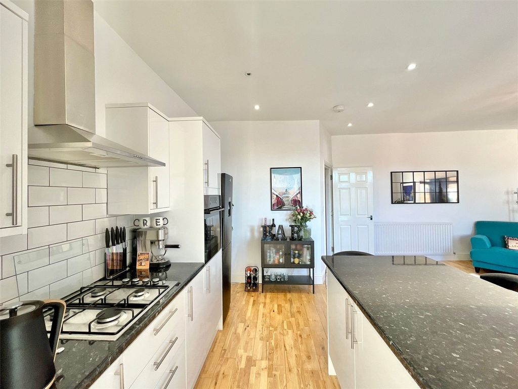 Property photo 2 of 12 Dining Kitchen