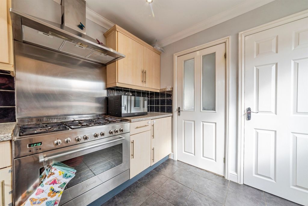 Property photo 2 of 12 Kitchen