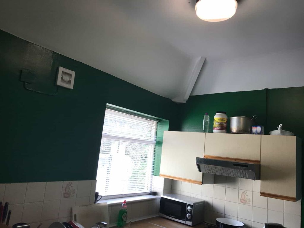 Property photo 1 of 5 A Functional Kitchen With A Window Providing Natur...