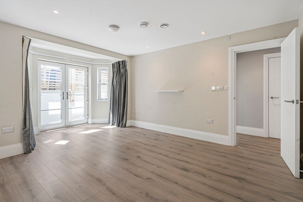 Property photo 3 of 12 Living/Dining Room