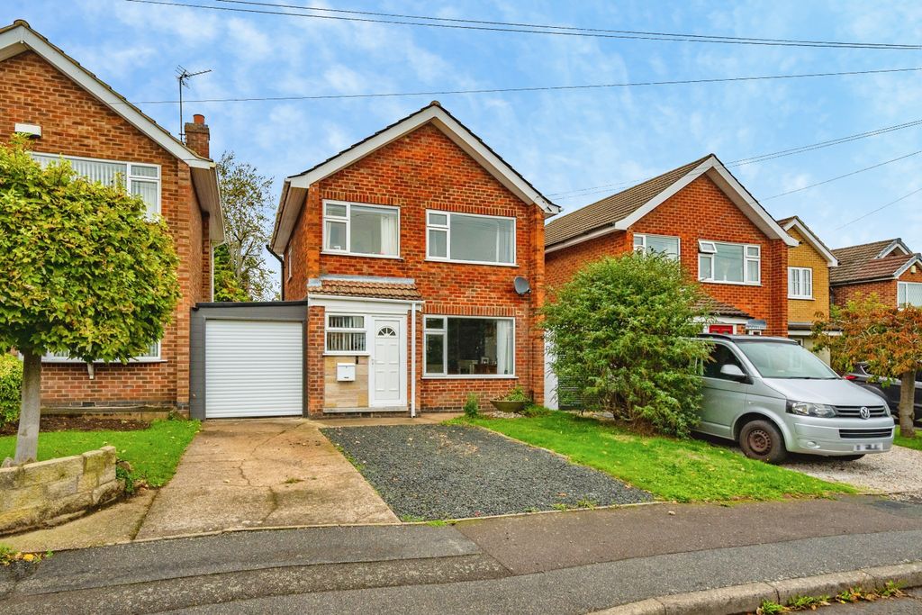 Property photo 1 of 15 Front With Driveway And Garage Access