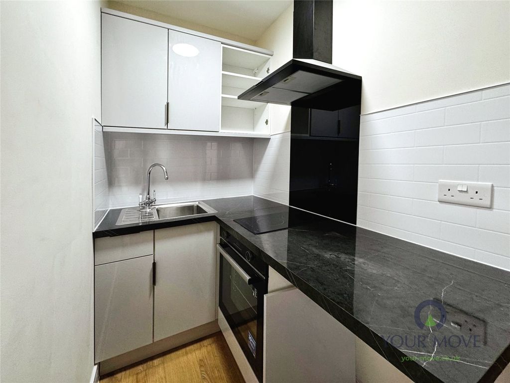 Property photo 3 of 7 Kitchen