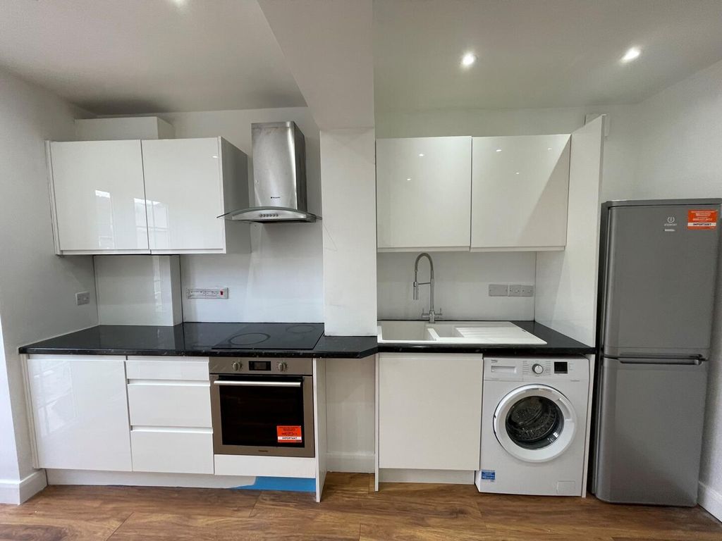 Property photo 3 of 12 Kitchen