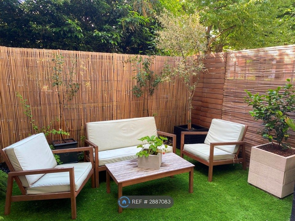 Property photo 2 of 17 Garden (Maintenance Free Grass/Astroturf)