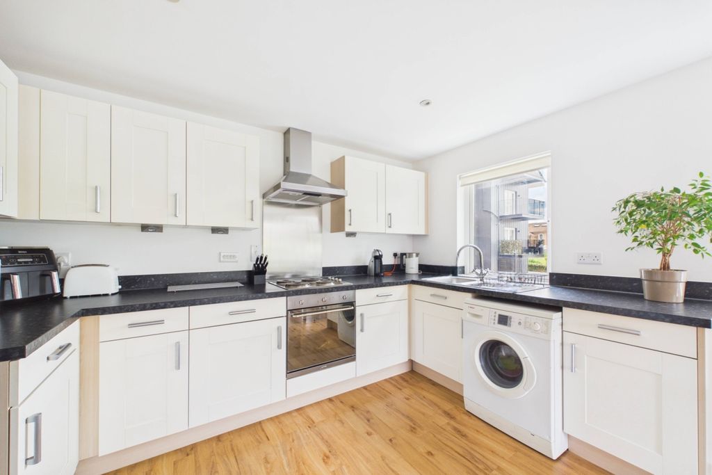 Property photo 3 of 12 Kitchen