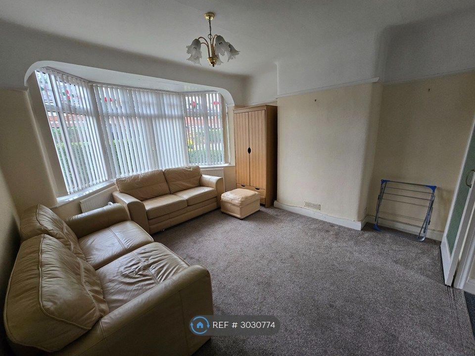 Property photo 2 of 12 Front Living Room