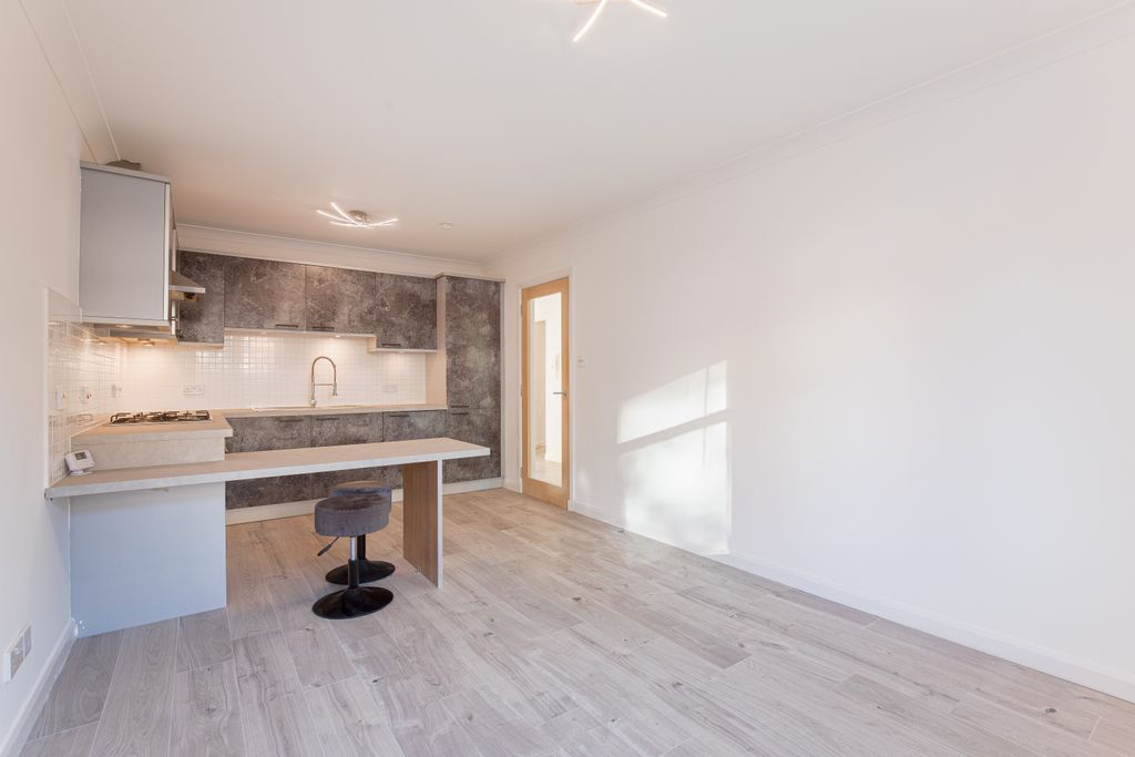 Property photo 1 of 12 Living2