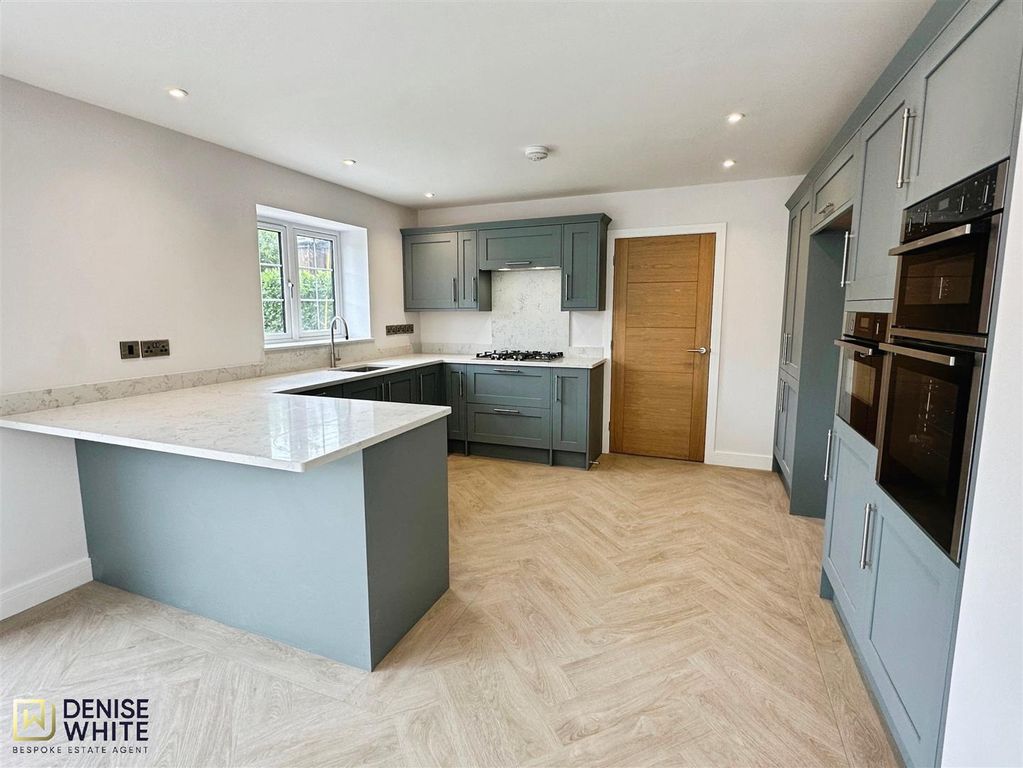 Property photo 2 of 27 Dining Kitchen