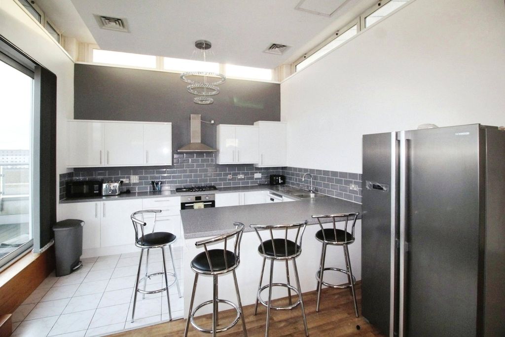 Property photo 3 of 13 Kitchen