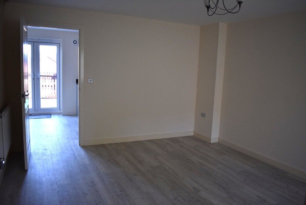 Property photo 3 of 12 Living Area