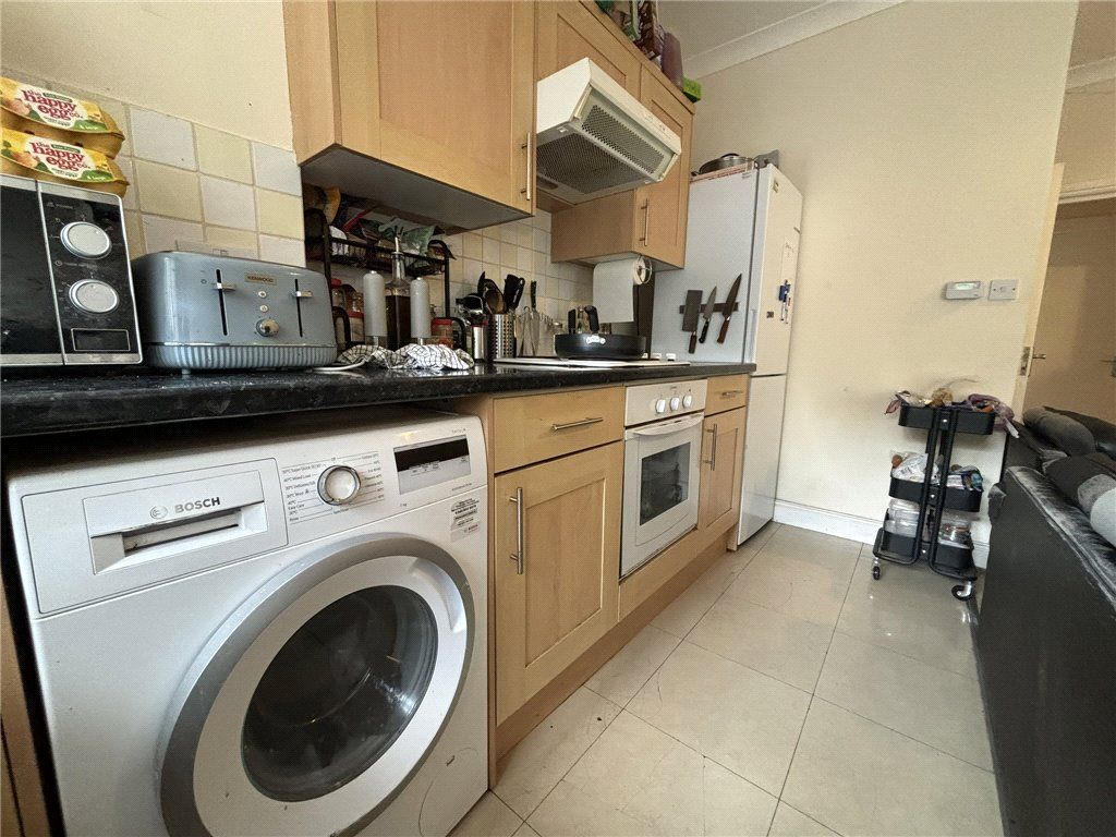 Property photo 3 of 12 Kitchen