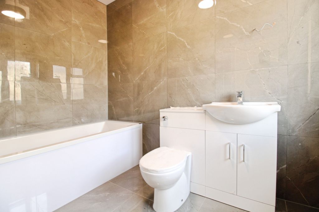Property photo 3 of 11 Downstairs Bathroom