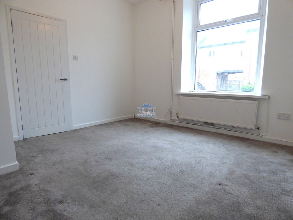 Property photo 2 of 8 Living Room