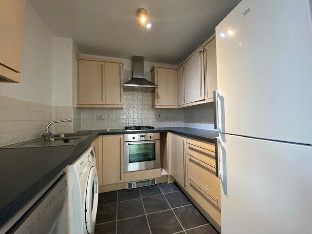 Property photo 3 of 9 Kitchen