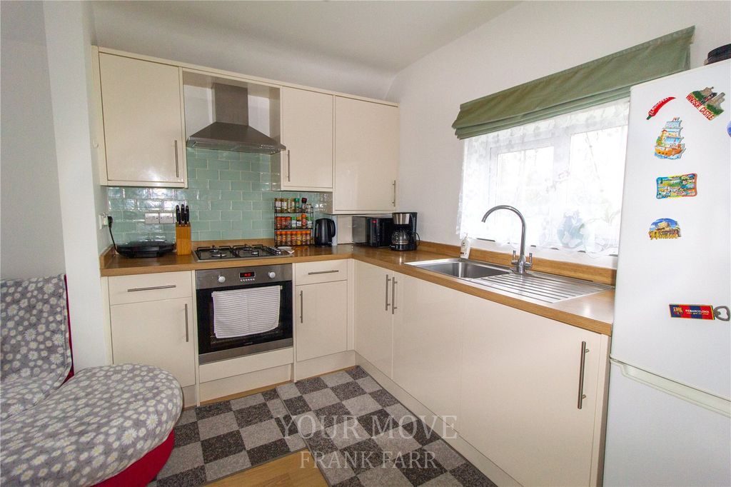 Property photo 3 of 8 Kitchen