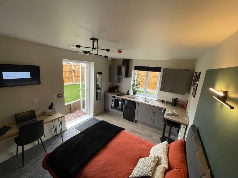 Property photo 1 of 18 Bright And Modern Master Bedroom Featuring A Comfo...