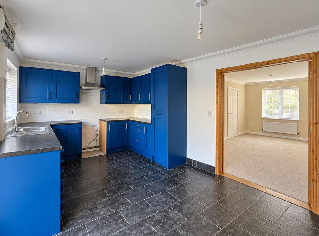 Property photo 2 of 12 Kitchen