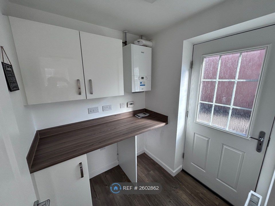 Property photo 2 of 16 Utility Room