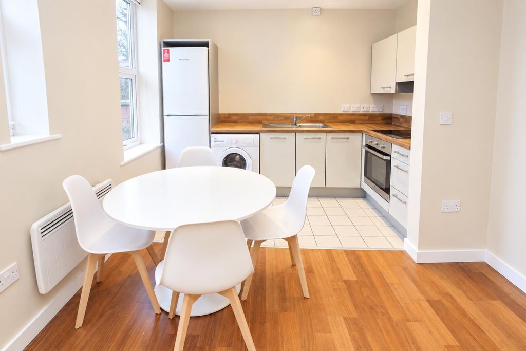 Property photo 3 of 11 Bright, Modern Open-Plan Kitchen And Dining Area...
