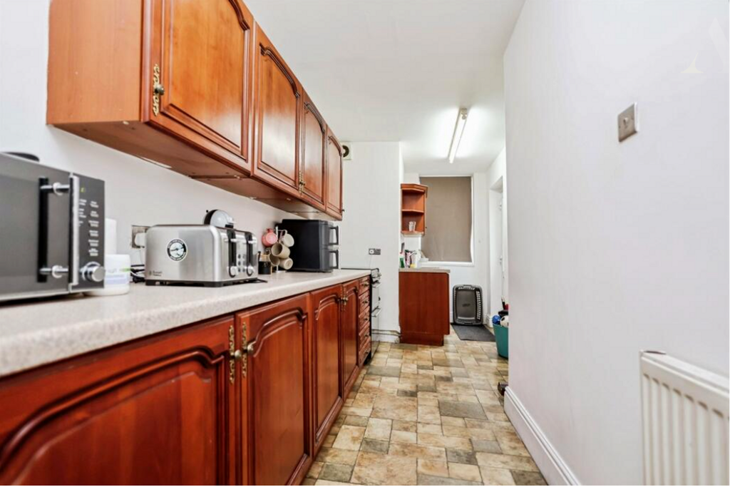 Property photo 3 of 12 Kitchen.Png
