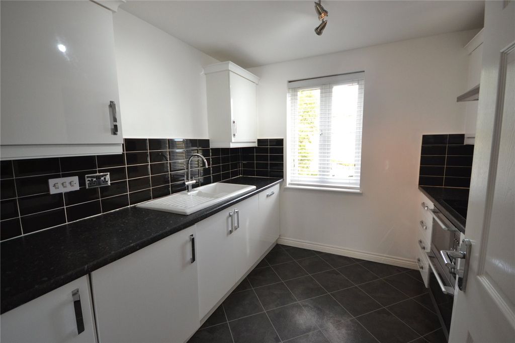 Property photo 3 of 11 Kitchen View 1