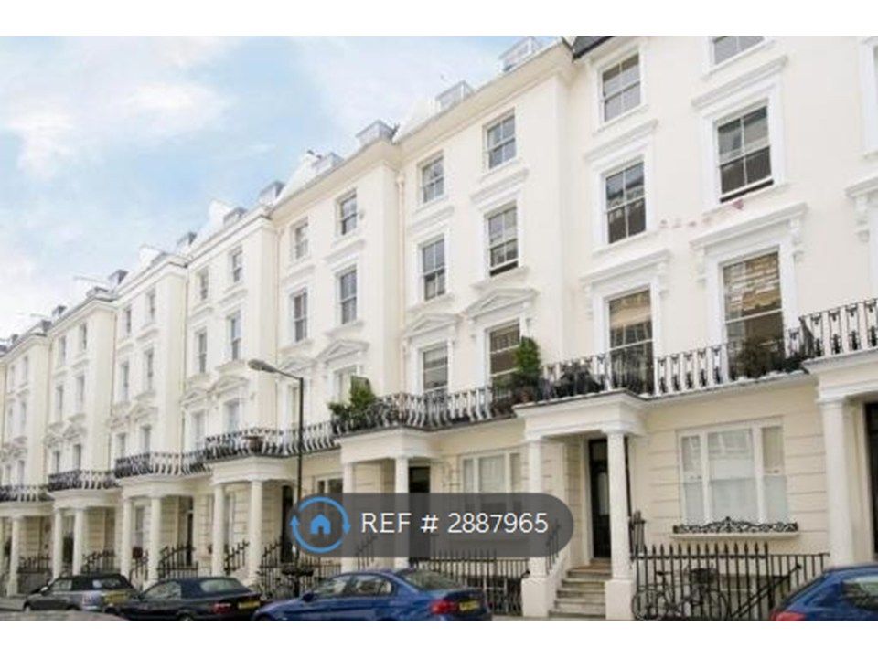 Property photo 2 of 10 White Stucco Building