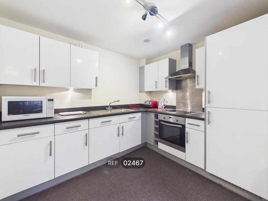 Property photo 2 of 14 Kitchen / Living Area