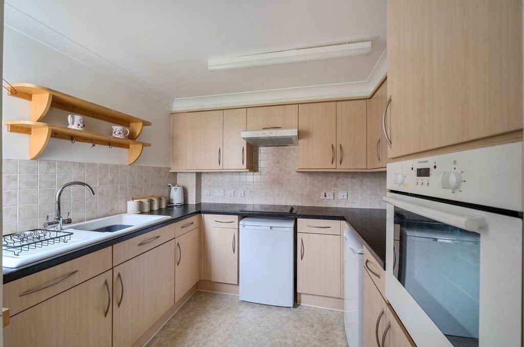 Property photo 3 of 12 Kitchen
