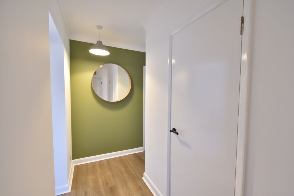 Property photo 2 of 9 Hallway And Storage