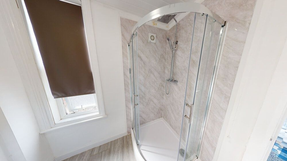 Property photo 3 of 8 A Spacious And Modern Bathroom Featuring A Large B...