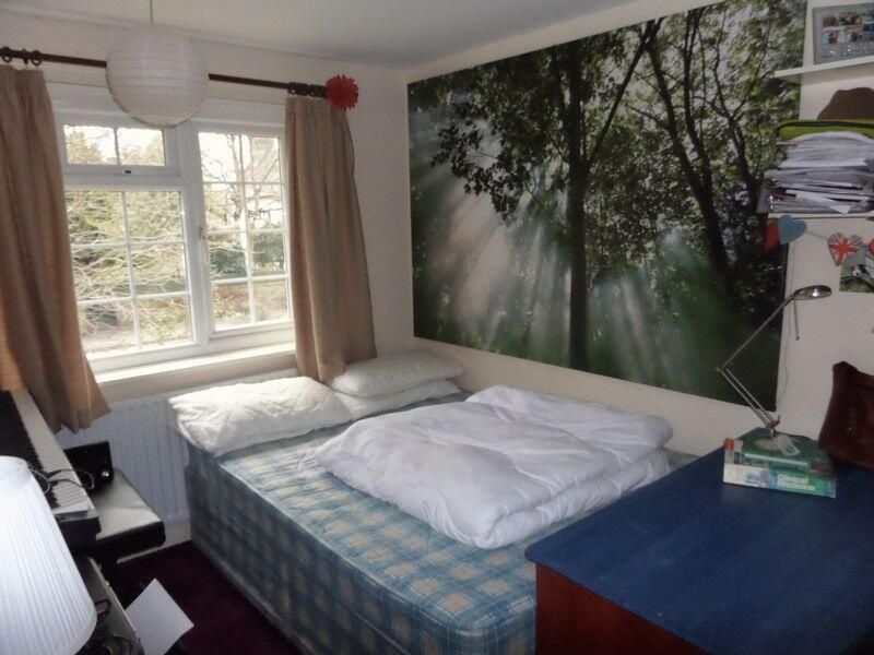 Property photo 1 of 6 A Cozy Bedroom With Natural Light From The Window,...