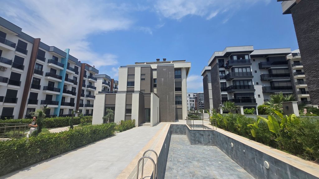 Property photo 1 of 11 Ground-Floor Apartment In Antalya For Sale - A Modern Complex With Social Areas