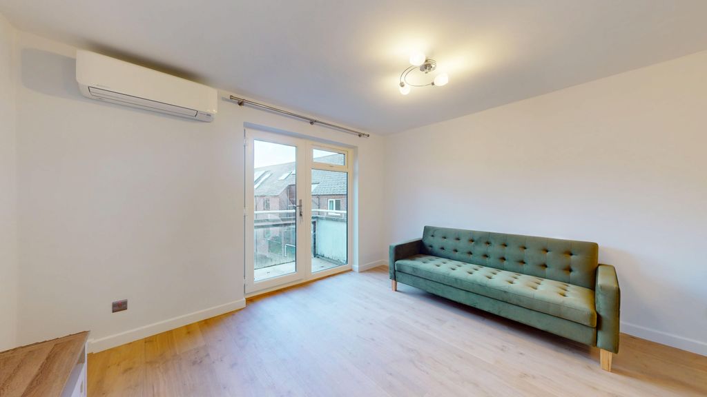 Property photo 3 of 9 Living Area - Angle 3