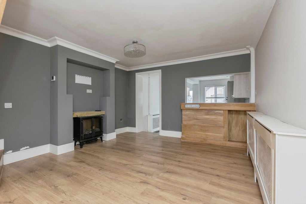 Property photo 3 of 12 Living Area